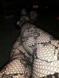Low section of woman on floor
