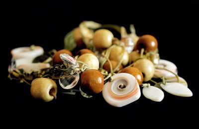 Close-up of fruit over black background