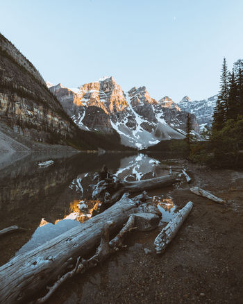 Scenic view of mountains against clear sky during winter