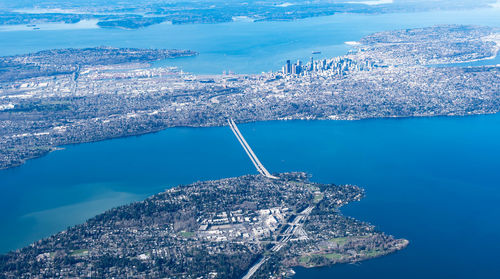 High angle view of cityscape against sea