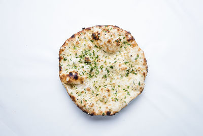 High angle view of pizza against white background