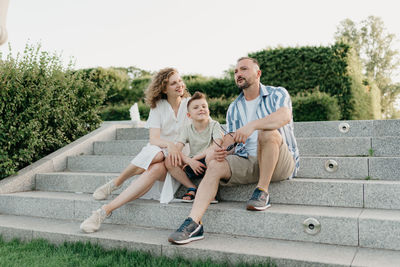 Friends sitting on steps