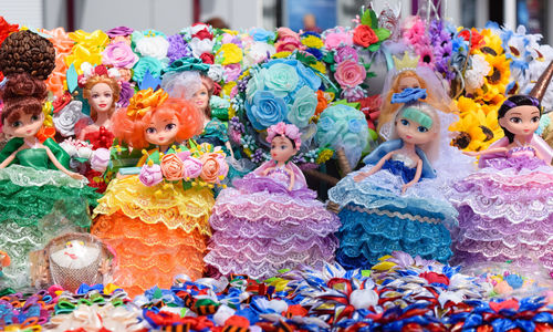 Close-up of multi colored toys for sale at market