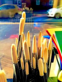 Close-up of paintbrushes on table