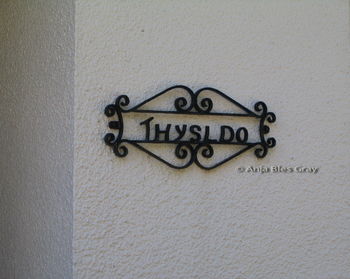 Close-up of text on wall
