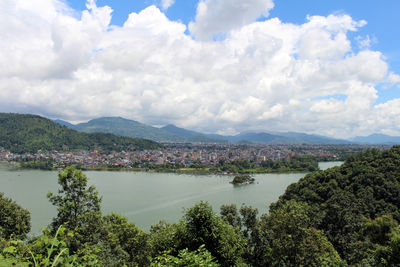 Scenic view of bay against sky