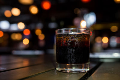 Close-up of beer glass on table