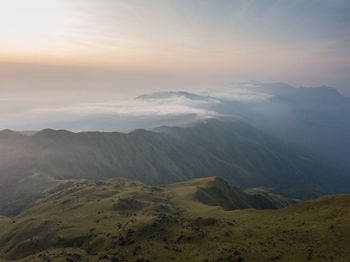 Scenic view of mountains against sky during sunset