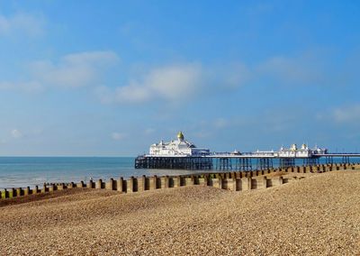 Scenic view of beach against sky