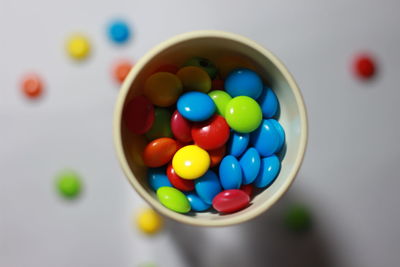 High angle view of multi colored balls on table