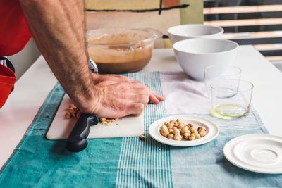 Midsection of man having breakfast