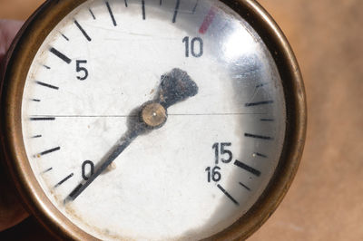 Close-up of clock on wall