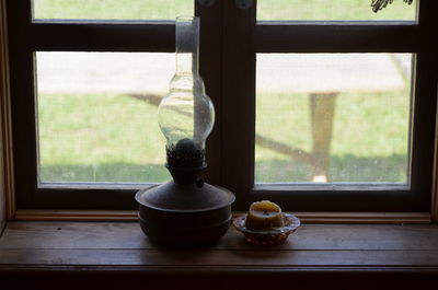 Tea cup on window sill at home