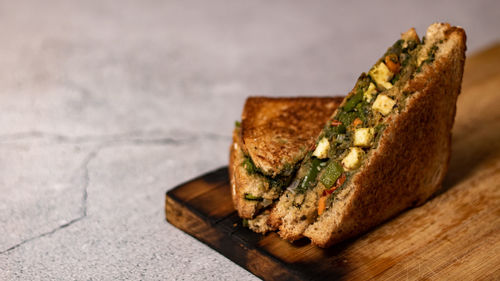 Close-up of bread on cutting board