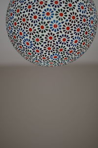 Close-up of hanging over white background