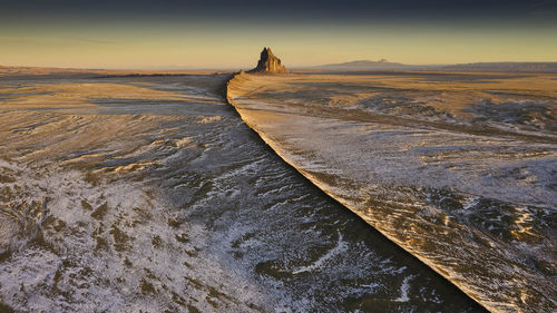 Scenic view of land during sunset
