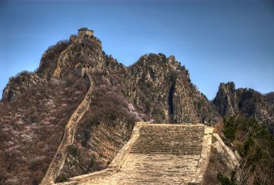 Great wall of china and mountain against blue sky