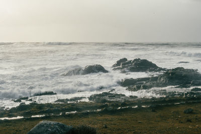 Scenic view of sea against clear sky