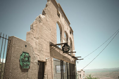 Low angle view of built structure against clear sky