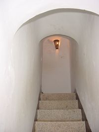 Low angle view of illuminated staircase in building