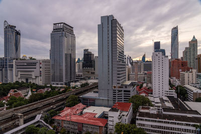 Bangkok, thailand - 12 august 2022 - view of bangkok cityscape high-rises and bts skytrains