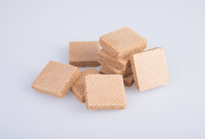 High angle view of bread on white background