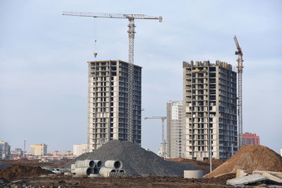 Modern buildings against sky in city