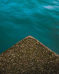 High angle view of rock on beach