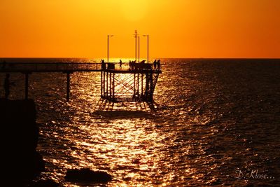 Scenic view of sea at sunset