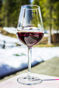 Close-up of wineglass on table