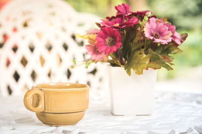 Close-up of coffee cup on table