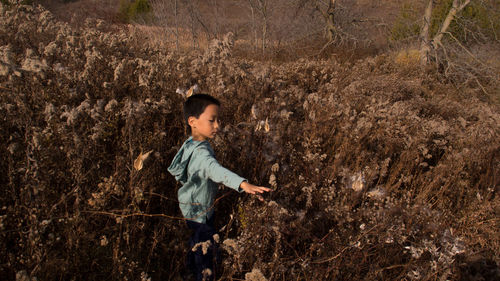 Side view of a boy looking away