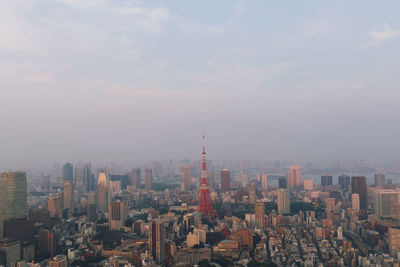 View over tokyo tower from mori tower, roppongi hills, tokyo, japan