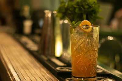 Close-up of drink on glass table