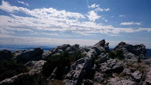 Scenic view of rocks against sky