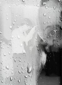 Close-up of water drops on glass