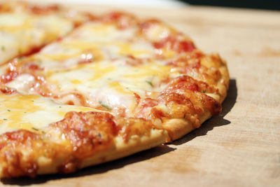 Close-up of pizza on cutting board