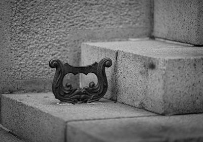 Close-up of an animal sculpture on wall