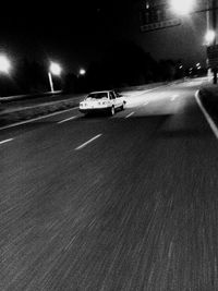 Cars on road at night