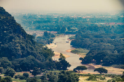 High angle view of trees on landscape against sky