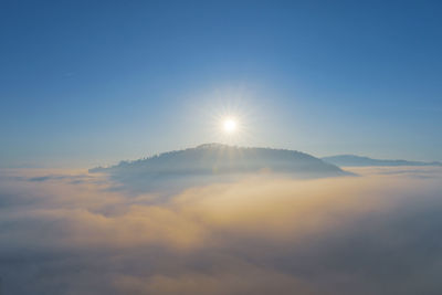 Scenic view of mountains against sky during sunset