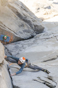 Rock climber crack climbing on the nose, el capitan in yosemite