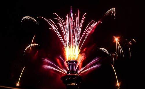 Firework display at night