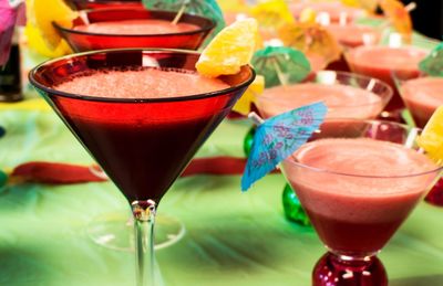 Close-up of drinks in martini glasses on table