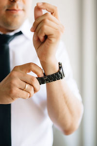 Close-up of man holding hands