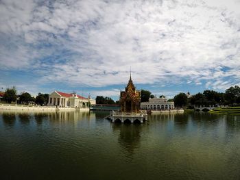 View of temple by river