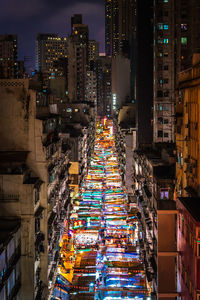 High angle view of illuminated buildings at night