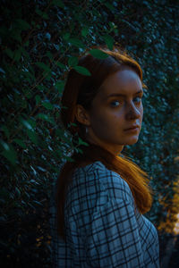Portrait of young woman looking away