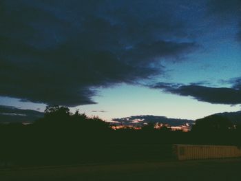 Scenic view of landscape against cloudy sky