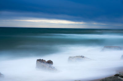 Scenic view of sea against sky during sunset